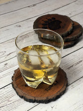 Load image into Gallery viewer, glass beverage with ice sitting on custom designed laser engraved acacia coaster